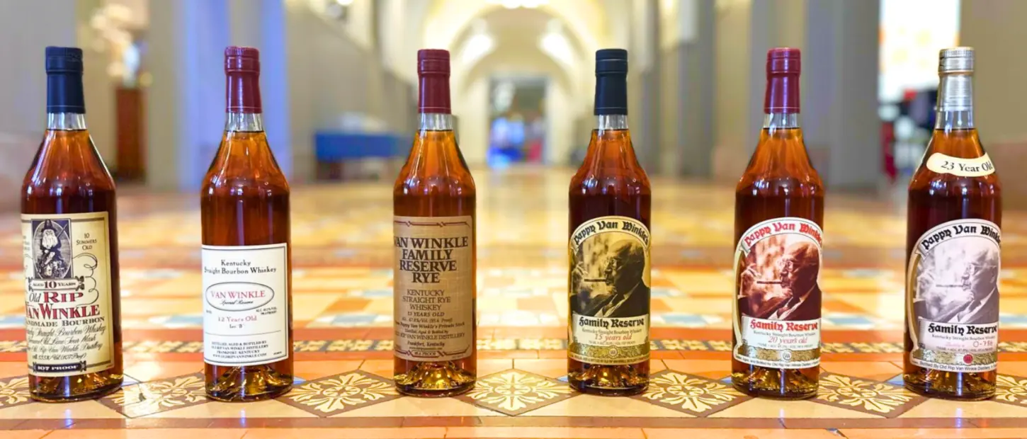 row of six pappy bottles
